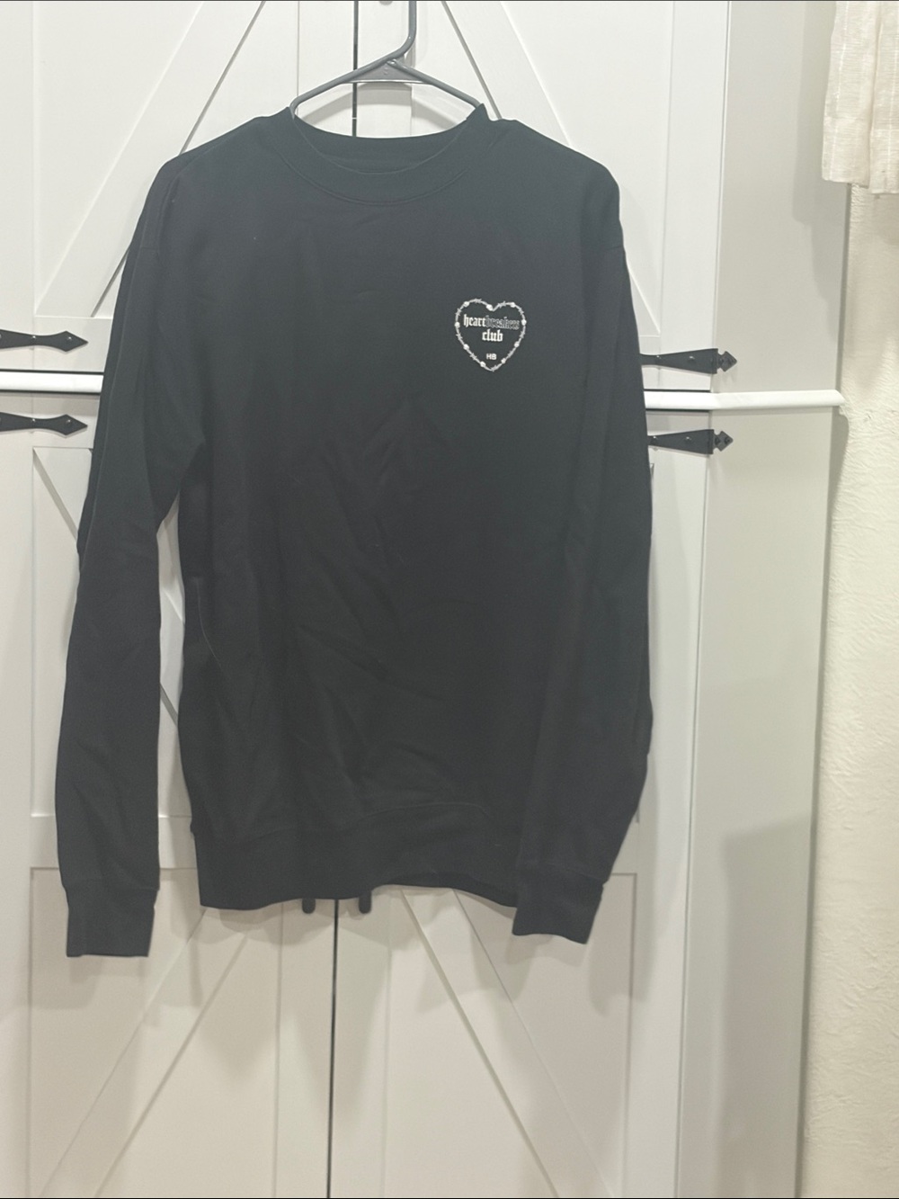 Black Crewneck Sweatshirt with Heart Emblem